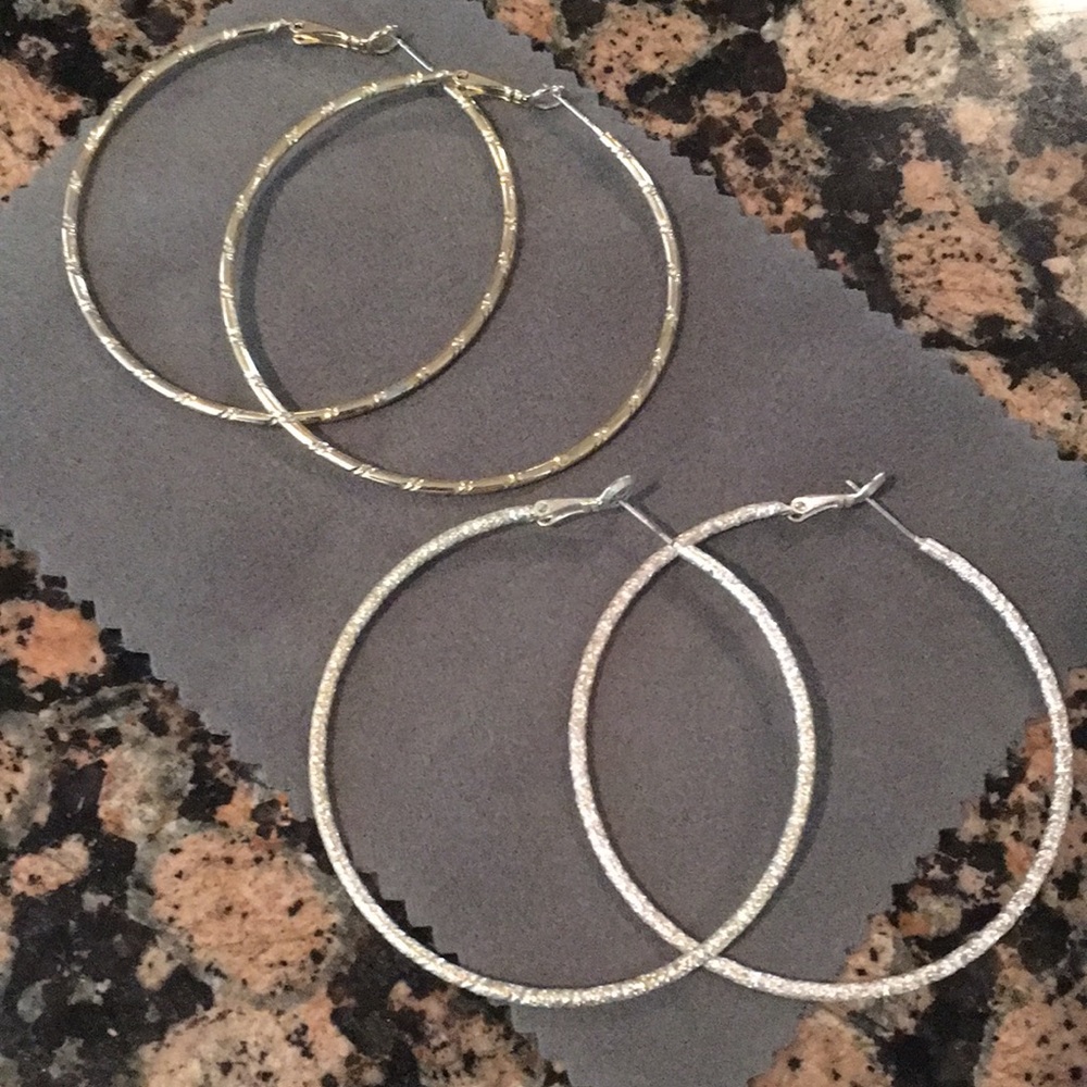 Gold hoops and silver hoops.